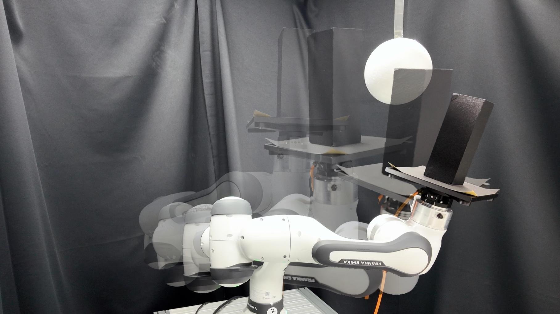 Motion snapshot: the tray passes below the obstacle and the object stays upright